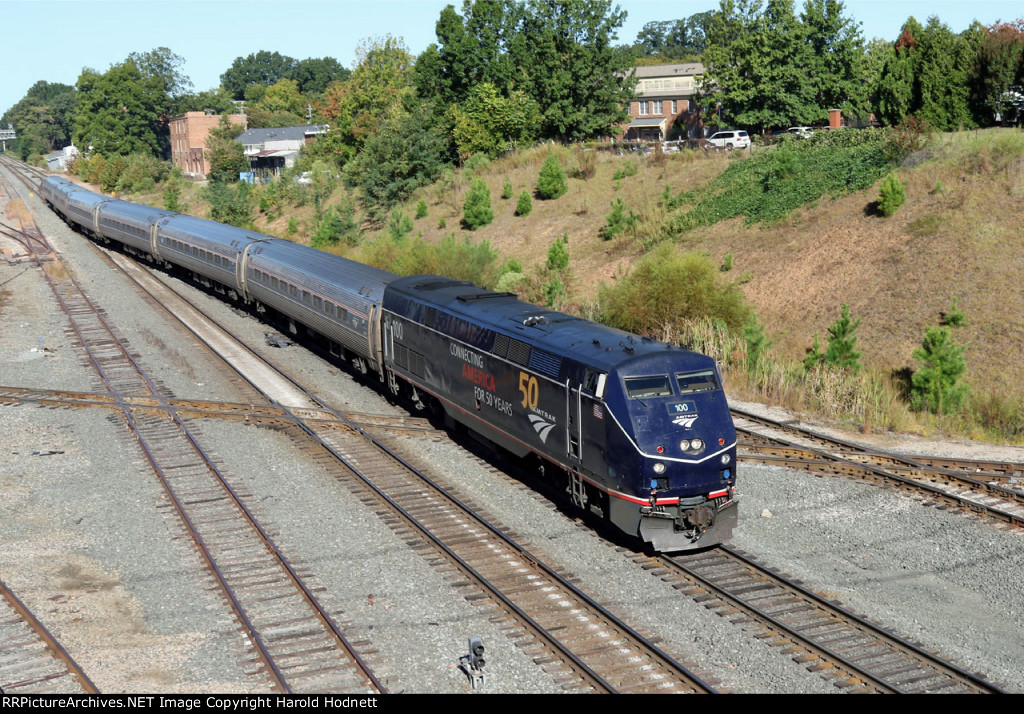 AMTK 100 leads train P080-06 across Boylan Junction